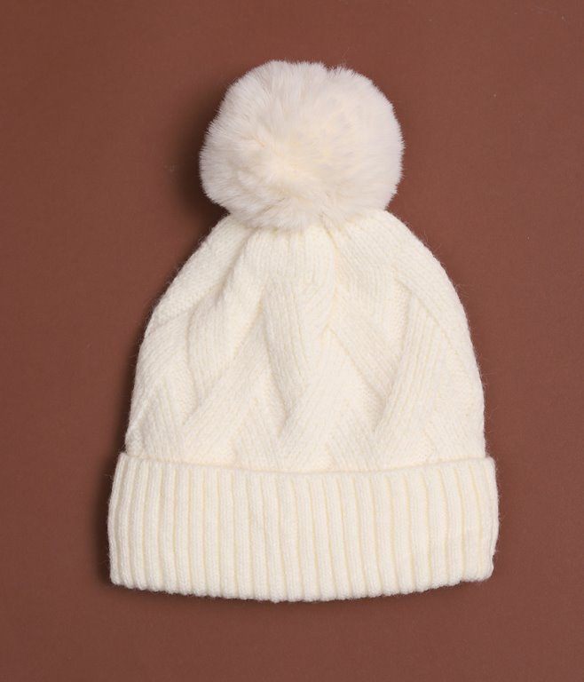 Bonnet à pompon en fausse fourrure