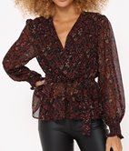 Top manches bouffantes Emmy